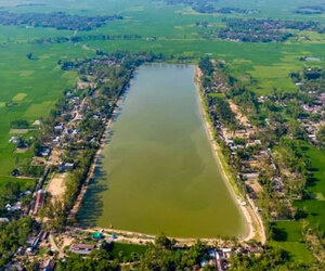 ভ্রমণপিপাসুদের নজর কাড়ছে জয়পুরহাটের নান্দাইল দীঘি